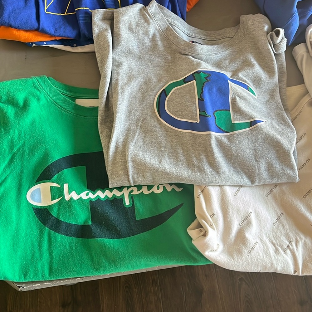 4 champion shirts